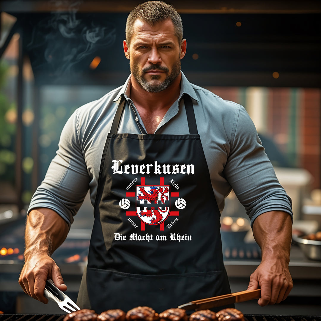 Grillschürze – „Leverkusen Macht am Rhein“ – BBQ Schürze mit Spruch für Männer